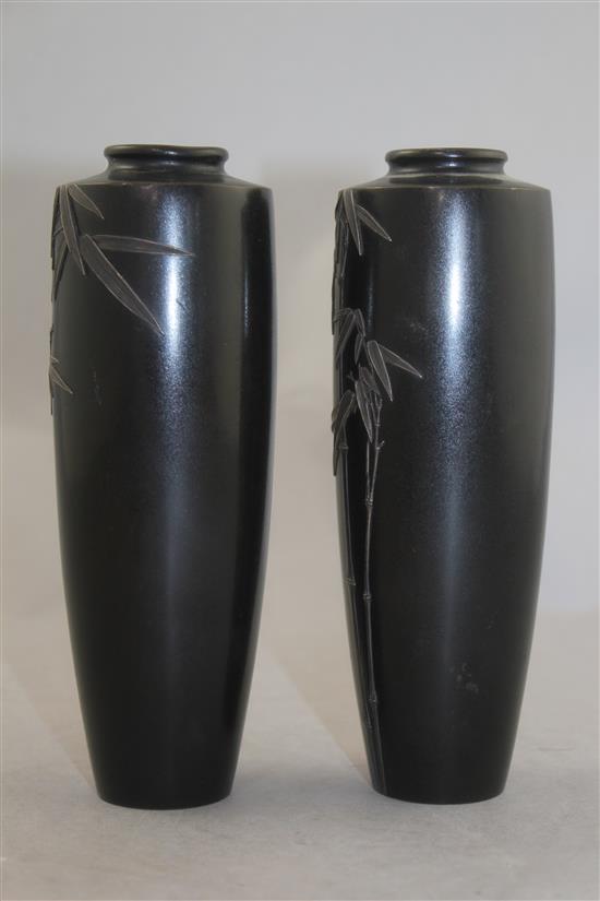 A pair of Japanese bronze and silver overlaid vases, Meiji period, by Hattori, 16.5cm